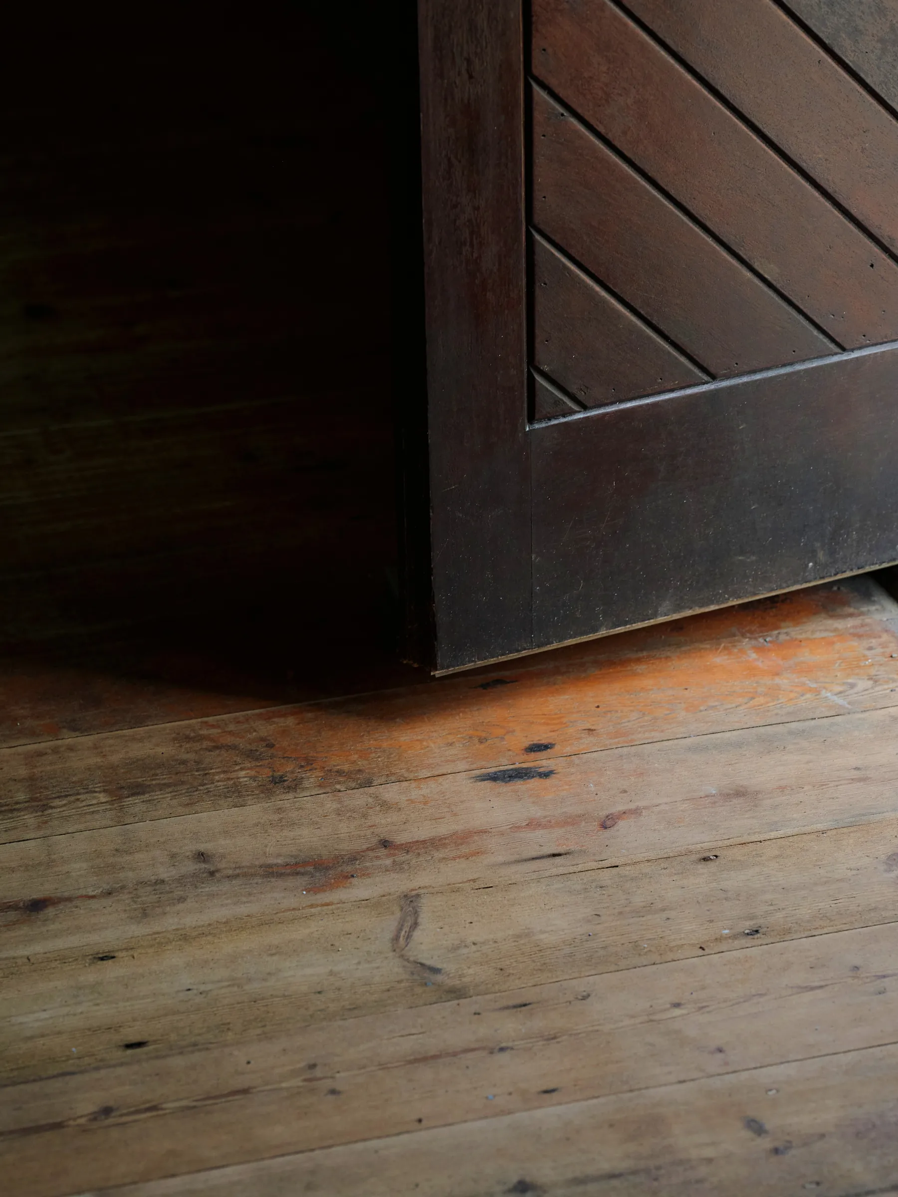 The open door and original floorboards inside The Church